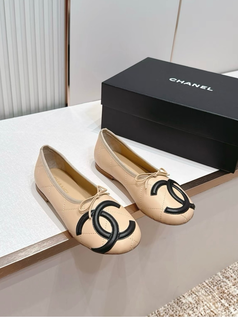 CHANEL Beige Leather Quilted Ballet Flats with Black CC Appliqué